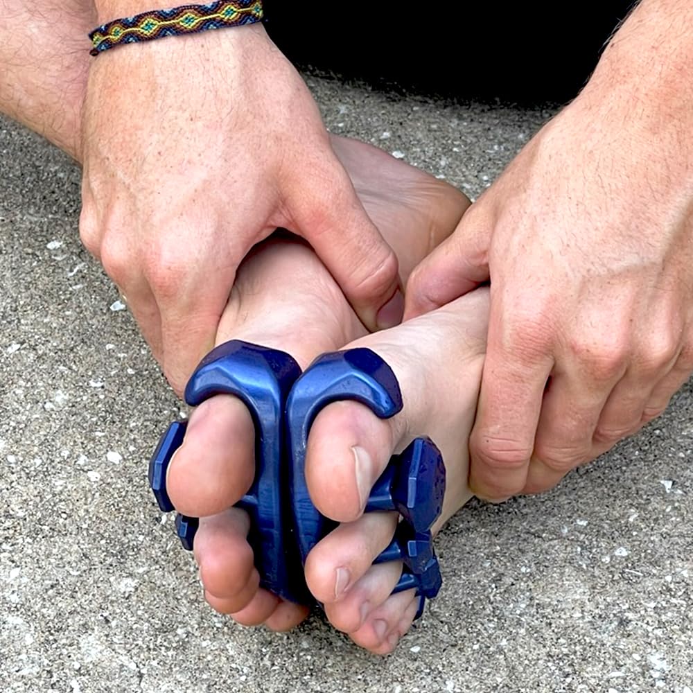 YogaToes Gems for Men in use while seated promoting post-workout recovery