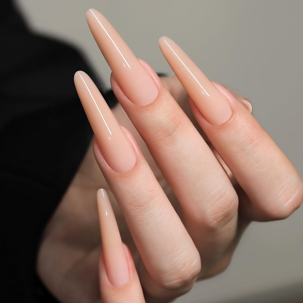 YOKE FELLOW salon scene with technician using dual forms for consistent nails