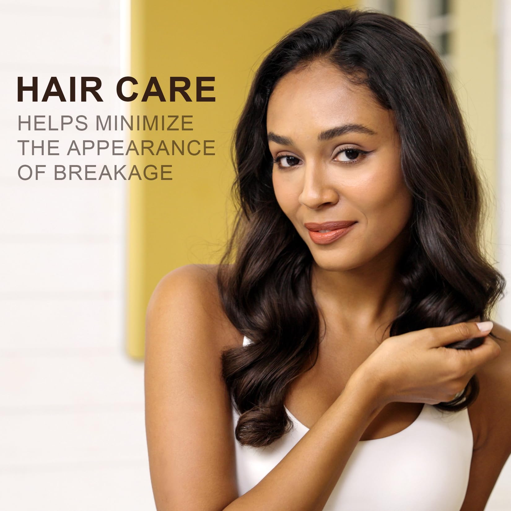 Yoken argan oil applied to hair ends to reduce frizz and add shine