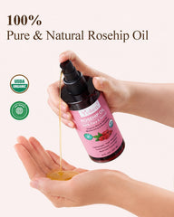 Yoken rosehip oil drop dispensing from bottle showing precise application benefit
