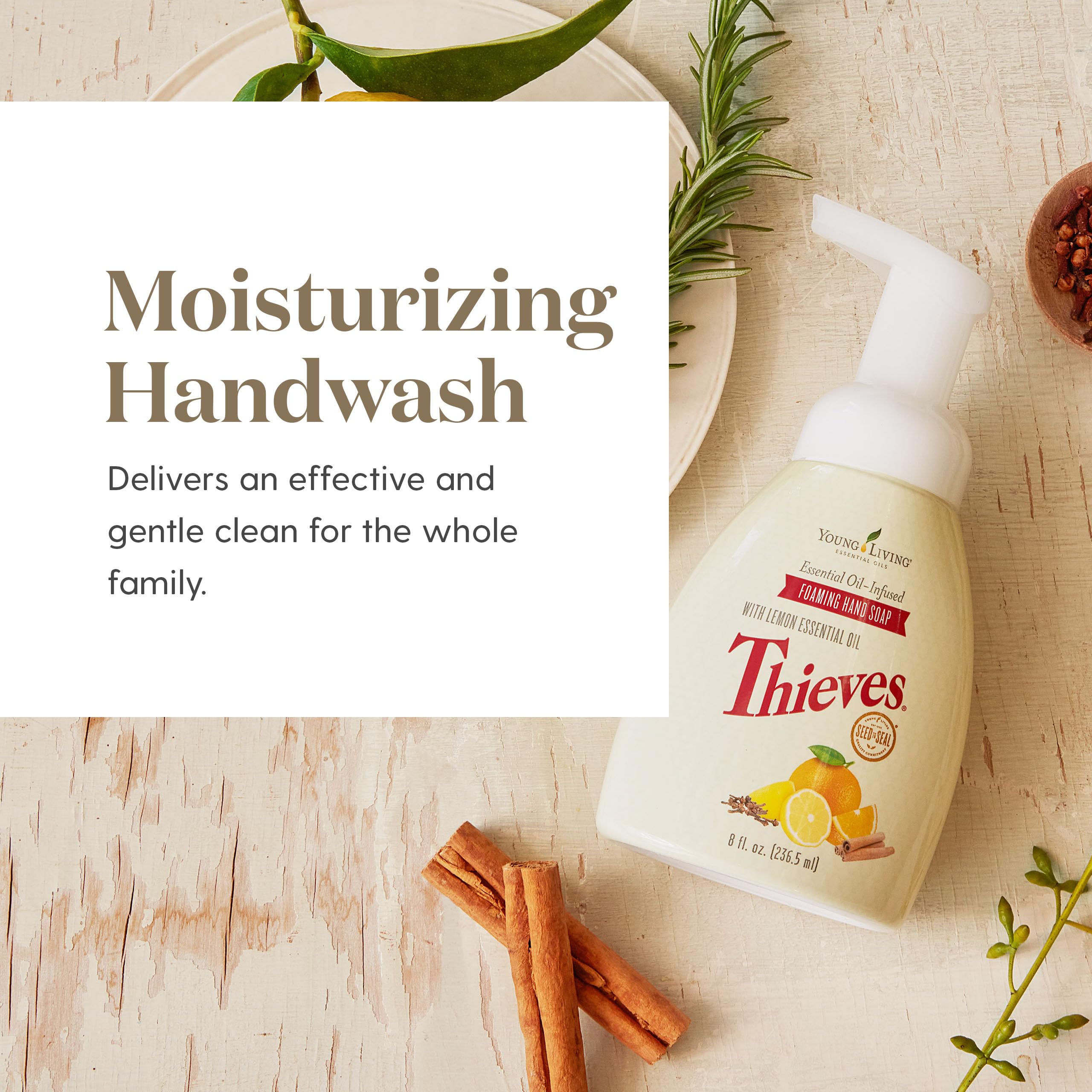 Young Living bottle held in hand to show 8 fl oz scale for easy placement