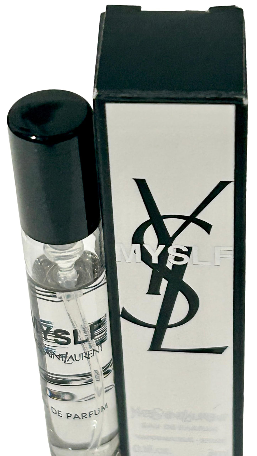 Yves Saint Laurent mini held in hand to show travel-friendly scale