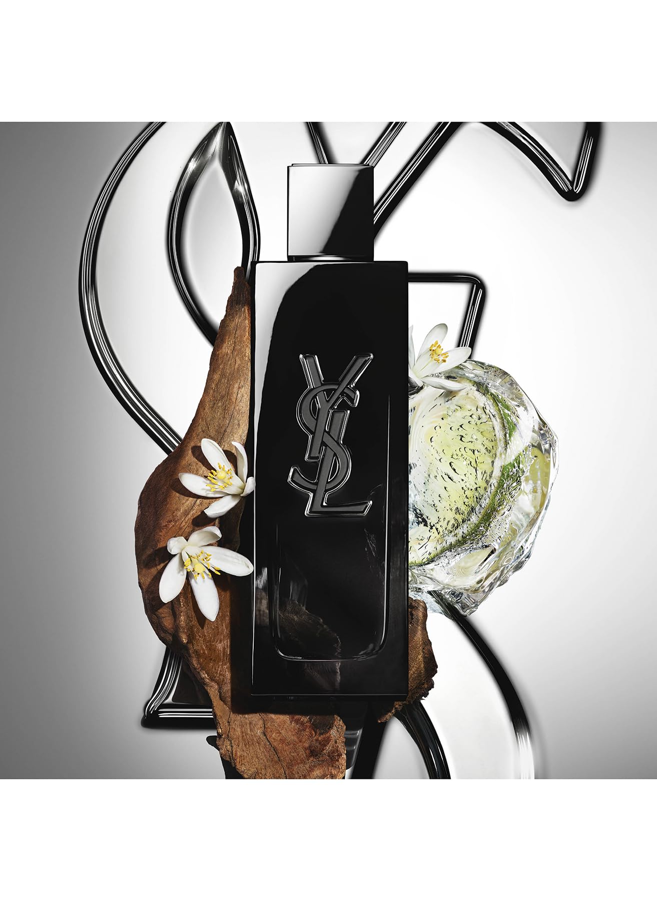 Yves Saint Laurent Myslf size comparison 2 oz beside wallet showing travel-friendly benefit