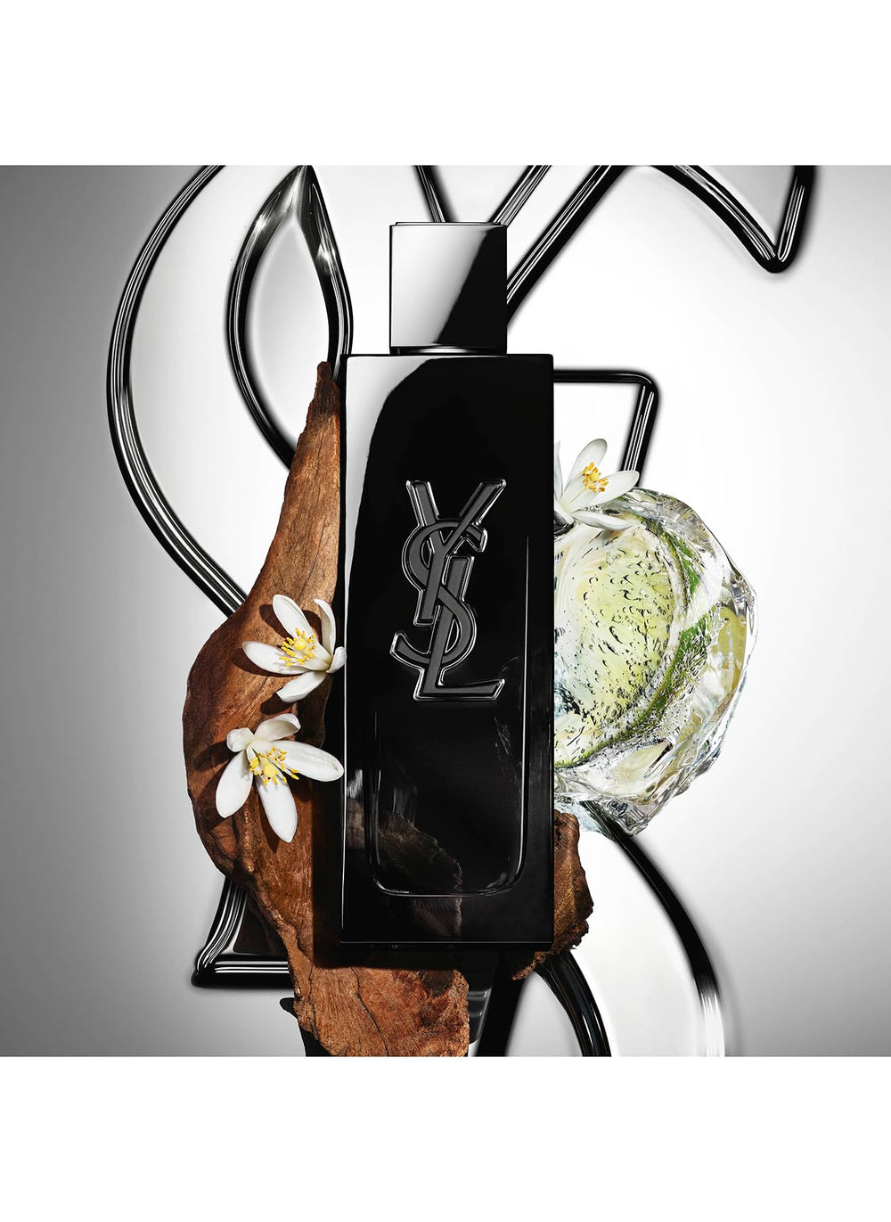 Yves Saint Laurent Myslf size comparison 2 oz beside wallet showing travel-friendly benefit