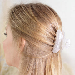 Yuxung clip holding half-up hairstyle offering stylish all-day control