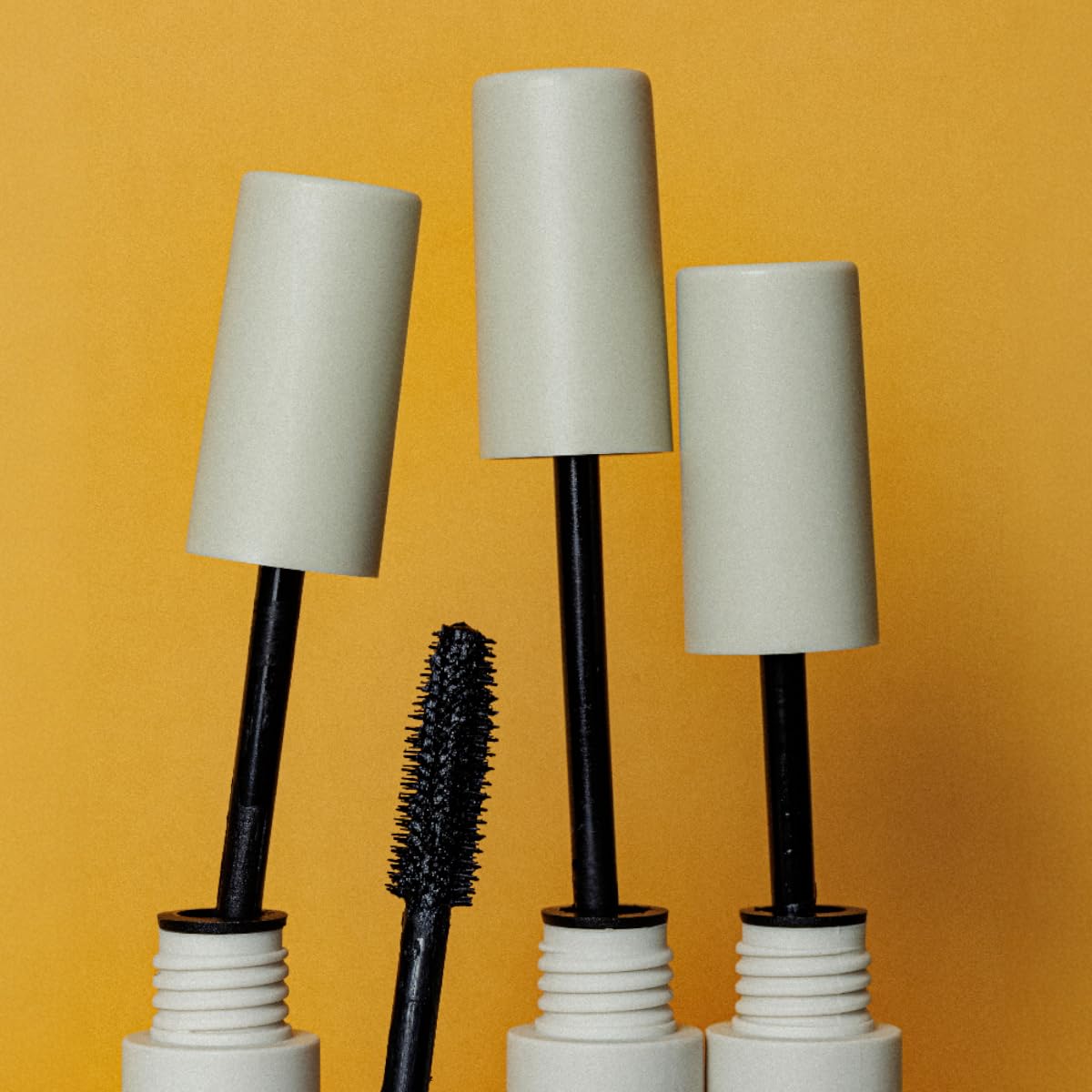 YuYa mascara open tube detail showing formula sheen and conditioning benefit