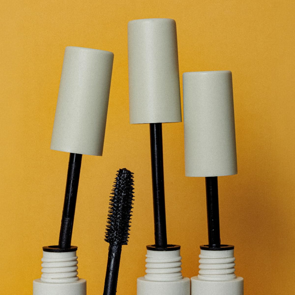 YuYa mascara open tube detail showing formula sheen and conditioning benefit