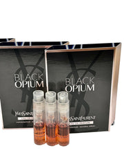 Yves Saint Laurent Black Opium close-up of spray nozzle and bottle texture highlighting precise application