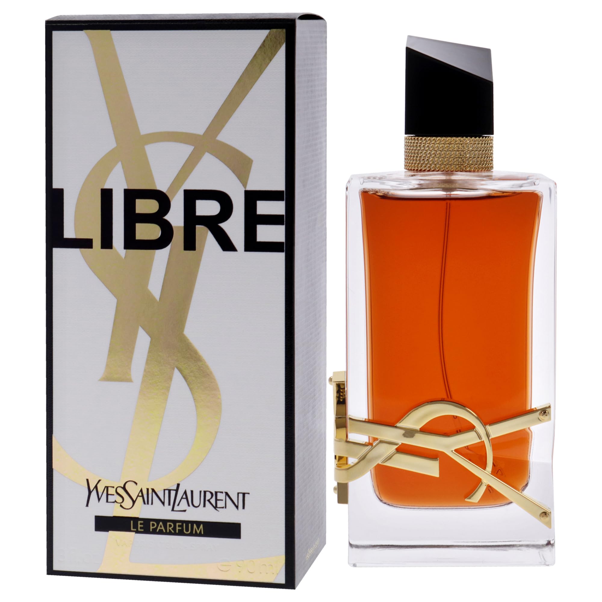 Yves Saint Laurent bottle on table in evening setting conveying sophisticated, long-wear fragrance