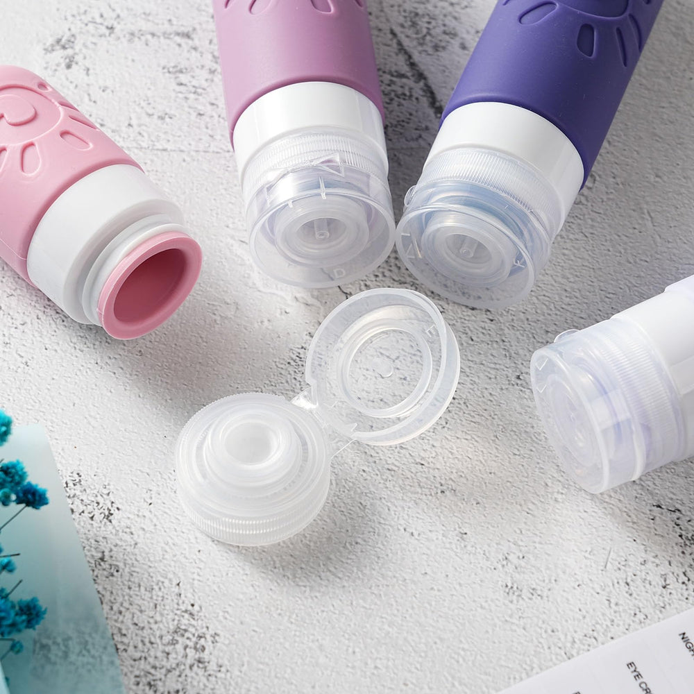 Zafit bottles in use with shampoo and conditioner to prevent leaks while traveling