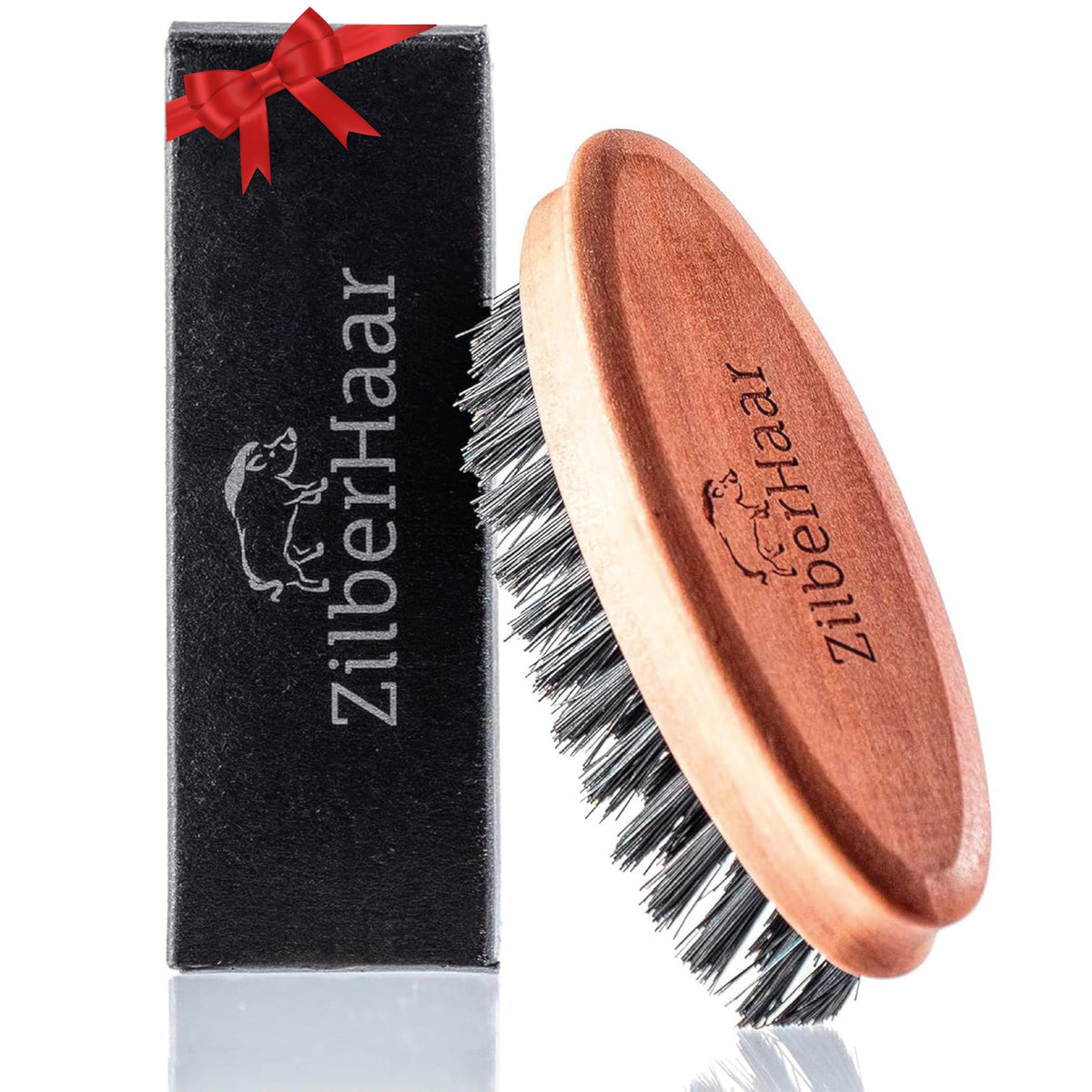 ZilberHaar pocket brush front view showing compact shape and bristles for quick grooming