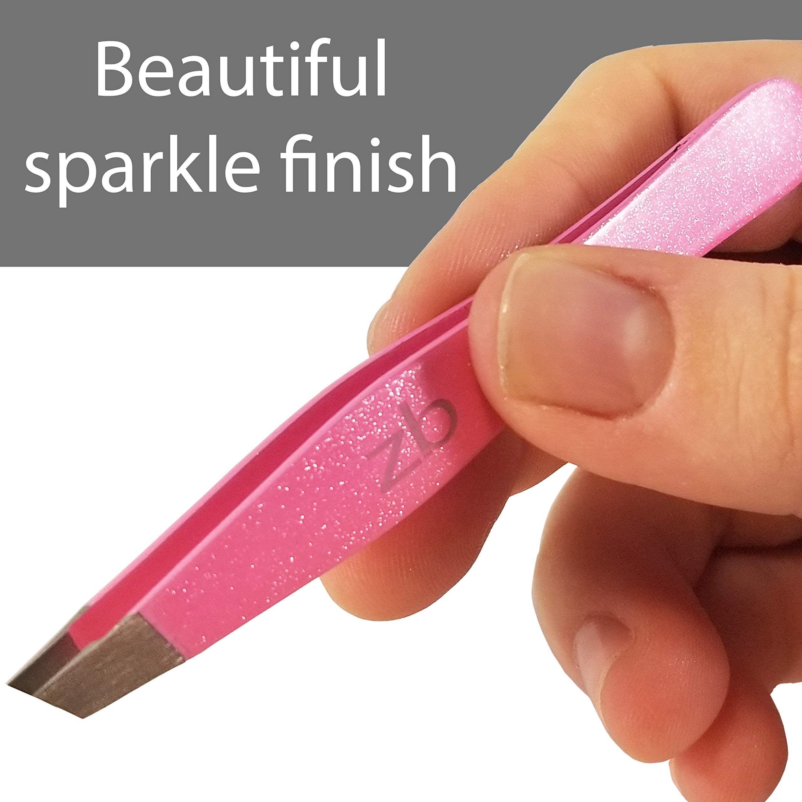 Zizzili Basics tweezers held in hand demonstrating ergonomic control
